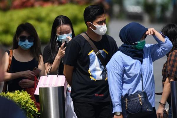 Status Waspada Virus Corona di Singapura Jadi Oranye